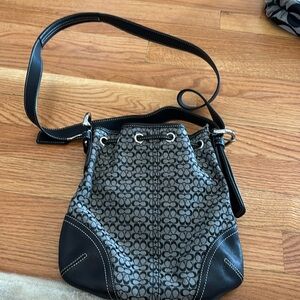 Brand new never used. Black c coach purse